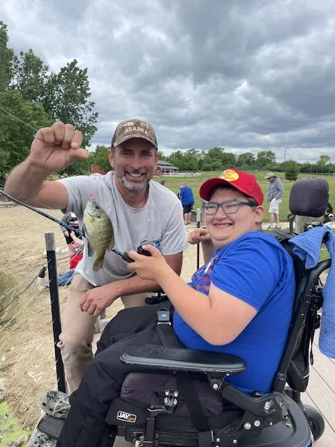 A VIP enjoying a M.A. Dailey Foundation fishing event